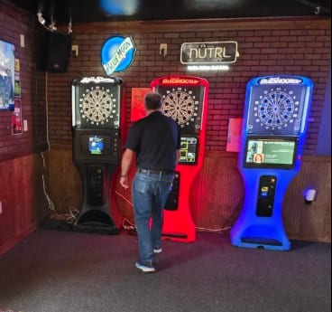 Three electronic dart machines at Dax's