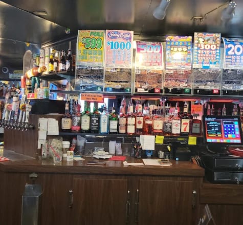Pull tab dispensers behind the bar at Dax's